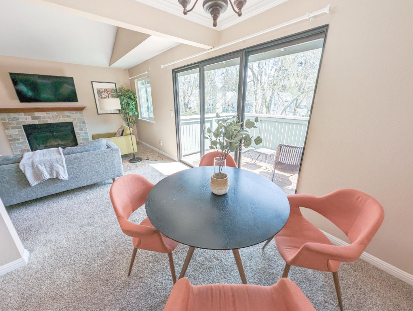205 Compton Circle, Unit B San Ramon, CA 94583 - Photo 7 of 24 a view of a dining room with furniture a large window and a livingroom