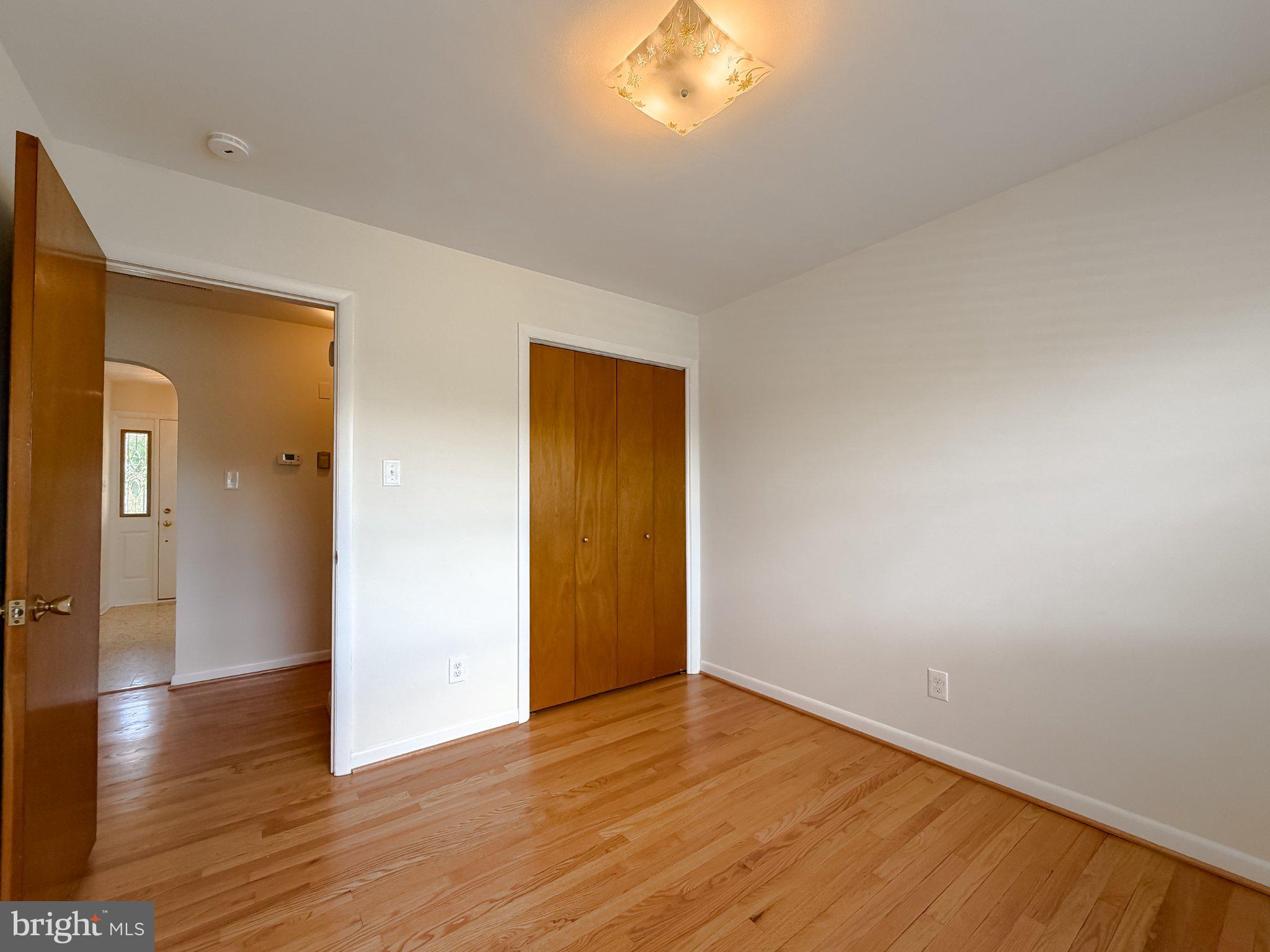 23230 Colton Point Road Avenue, MD 20609 - Photo 27 of 63 Bright and airy room with warm tones.