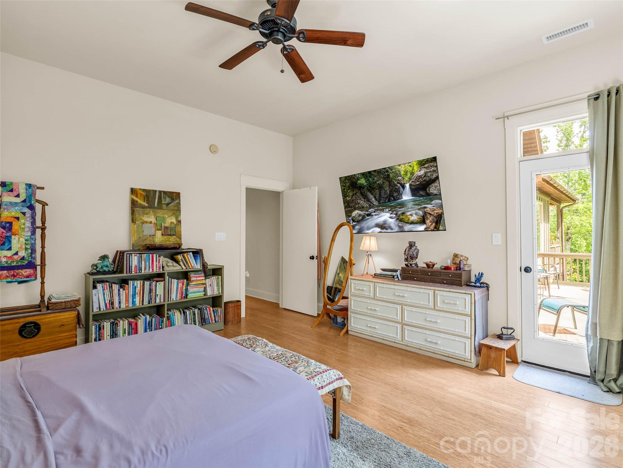 120 Glenn Court Mill Spring, NC 28756 - Photo 22 of 48 a bedroom with furniture and a bed