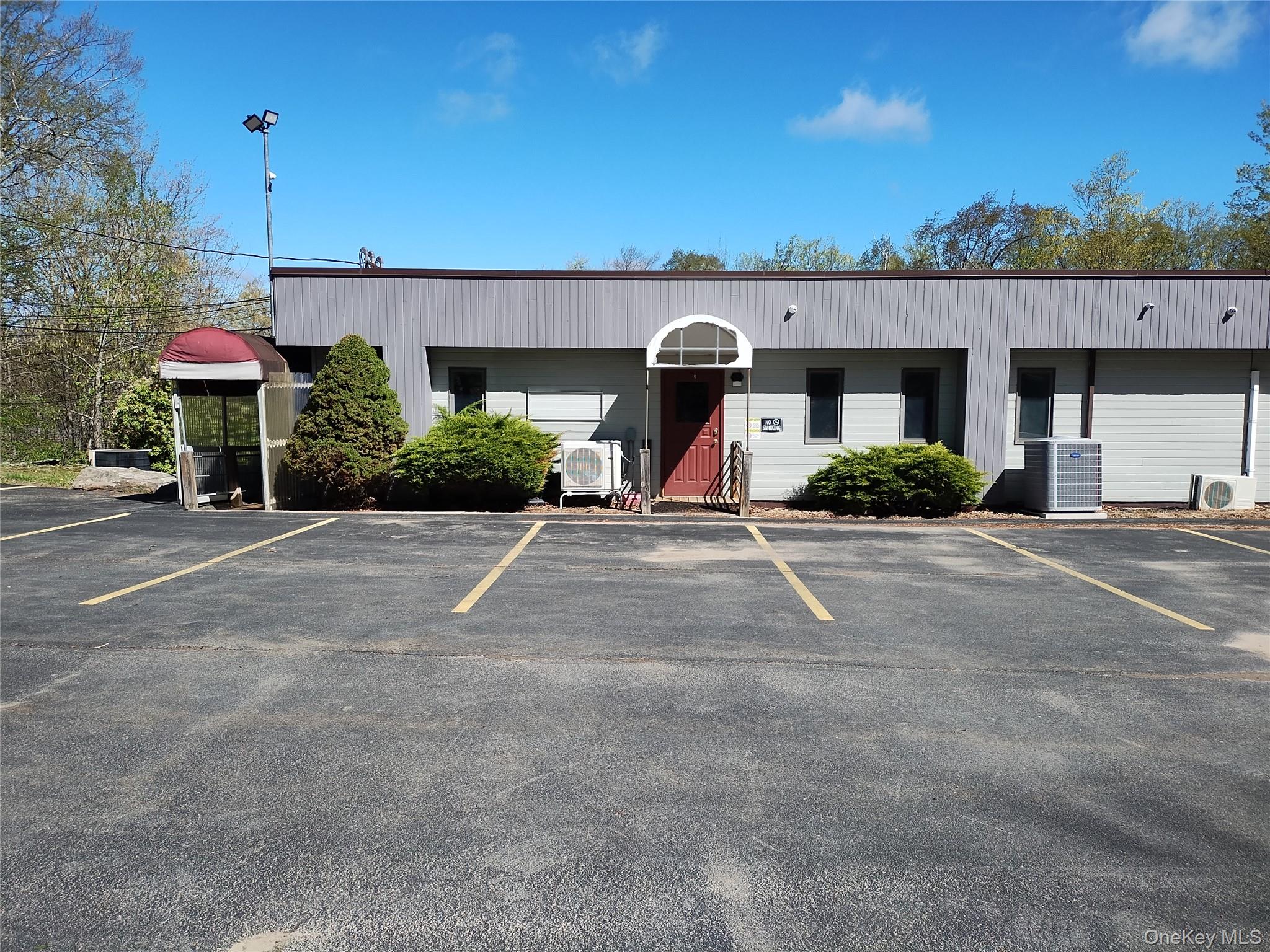 39 Old Monticello Road Liberty, NY 12754 - Photo 2 of 21 a view of a house with a yard and potted plants