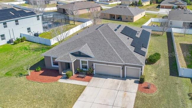 1422 Sharon Rose Trace Deltona, FL 32725 - Photo 15 of 42 a view of a house with pool and chairs