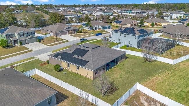 1422 Sharon Rose Trace Deltona, FL 32725 - Photo 19 of 42 an aerial view of residential houses with outdoor space