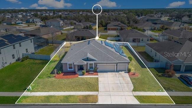 1422 Sharon Rose Trace Deltona, FL 32725 - Photo 21 of 42 a aerial view of a house with swimming pool