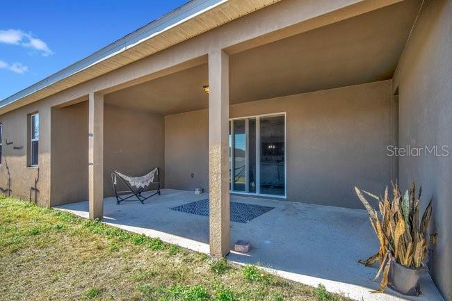 1422 Sharon Rose Trace Deltona, FL 32725 - Photo 9 of 42 a view of backyard with patio