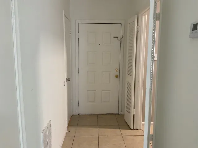 a view of a bathroom with a sink and a shower