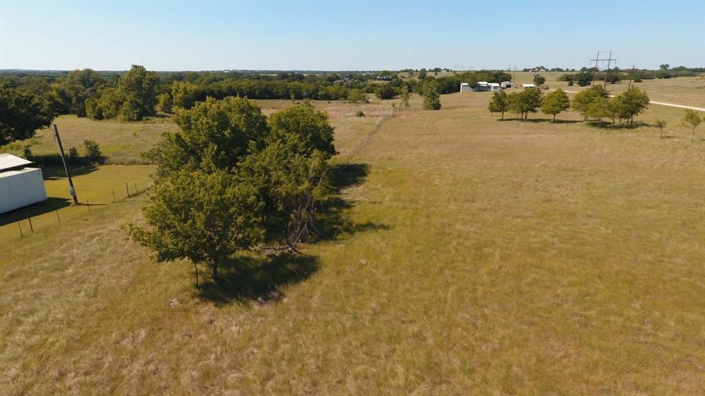4444 Belz Road Sanger, TX 76266 - Photo 9 of 13 a view of a lake with houses