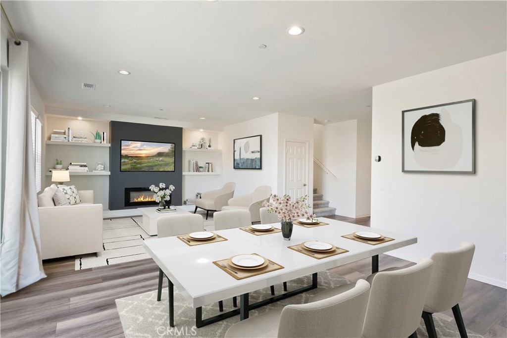 9605 Bonsai Lane Riverside, CA 92508 - Photo 11 of 41 a view of a dining room with furniture and wooden floor