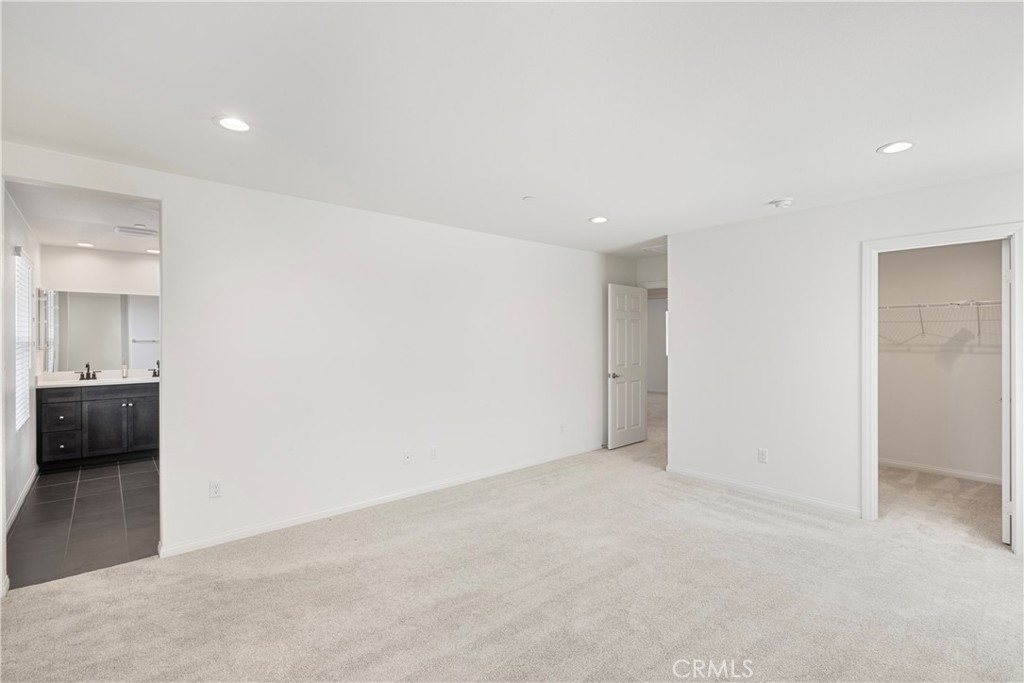 9605 Bonsai Lane Riverside, CA 92508 - Photo 16 of 41 an empty room with a bathroom