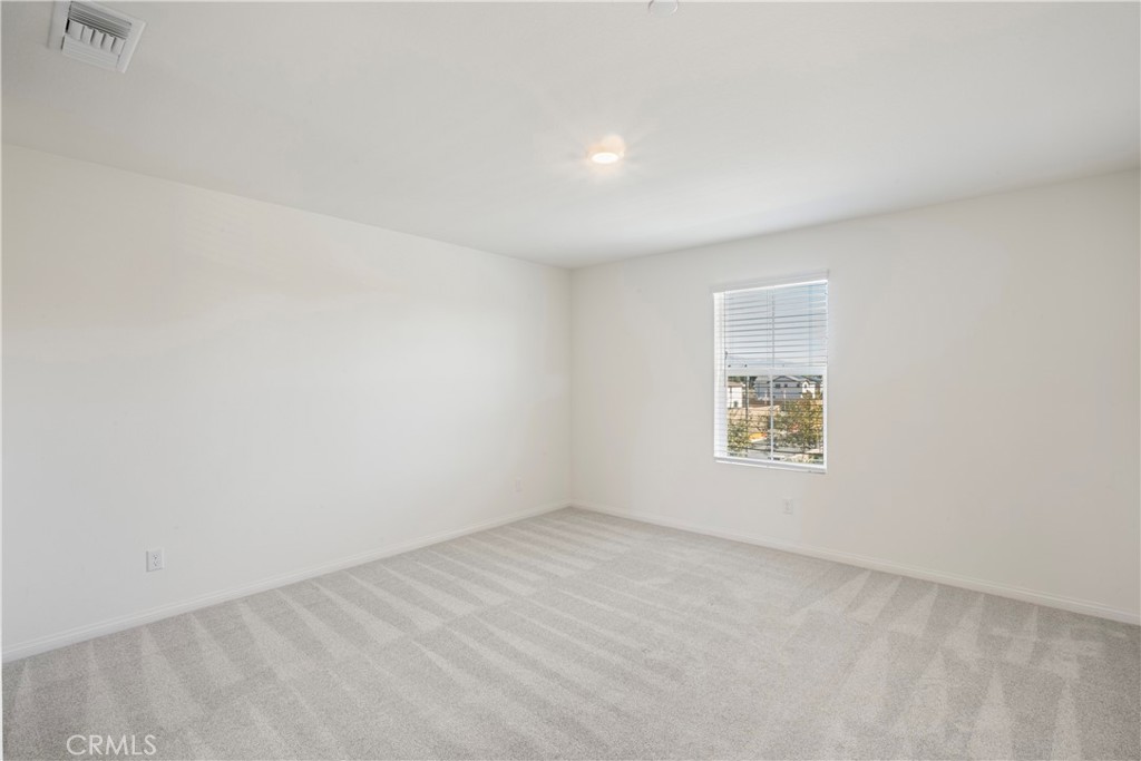 9605 Bonsai Lane Riverside, CA 92508 - Photo 23 of 41 an empty room with a window