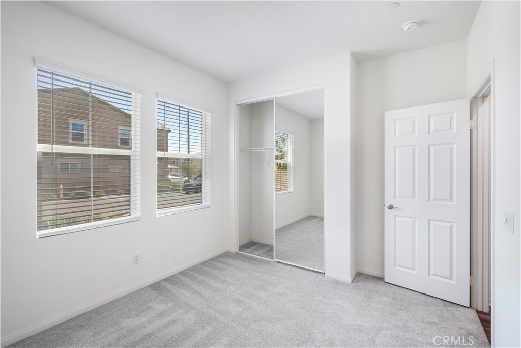 9605 Bonsai Lane Riverside, CA 92508 - Photo 26 of 41 an empty room with windows