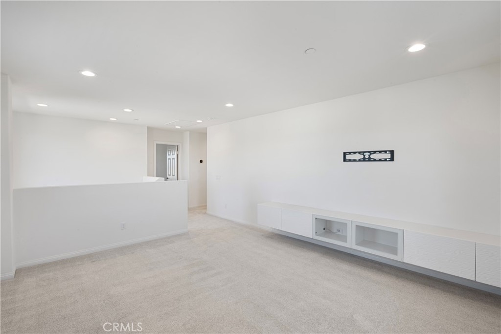 9605 Bonsai Lane Riverside, CA 92508 - Photo 29 of 41 an empty room with a empty space and windows