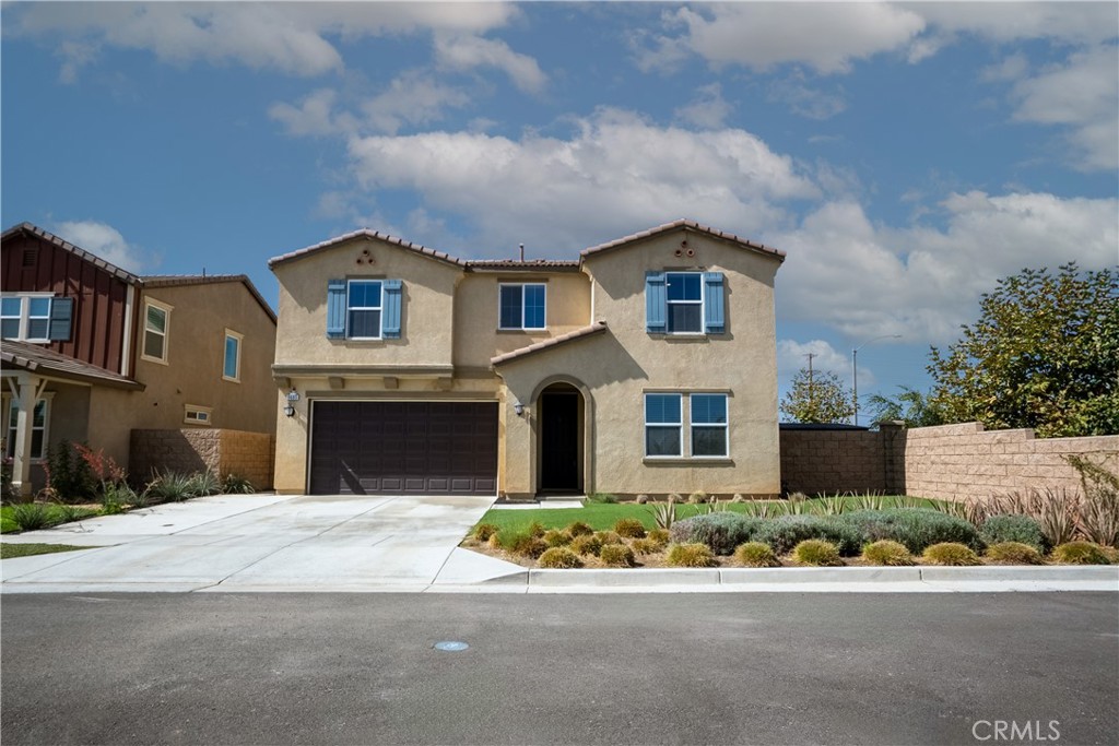 9605 Bonsai Lane Riverside, CA 92508 - Photo 41 of 41 a front view of a house with a yard