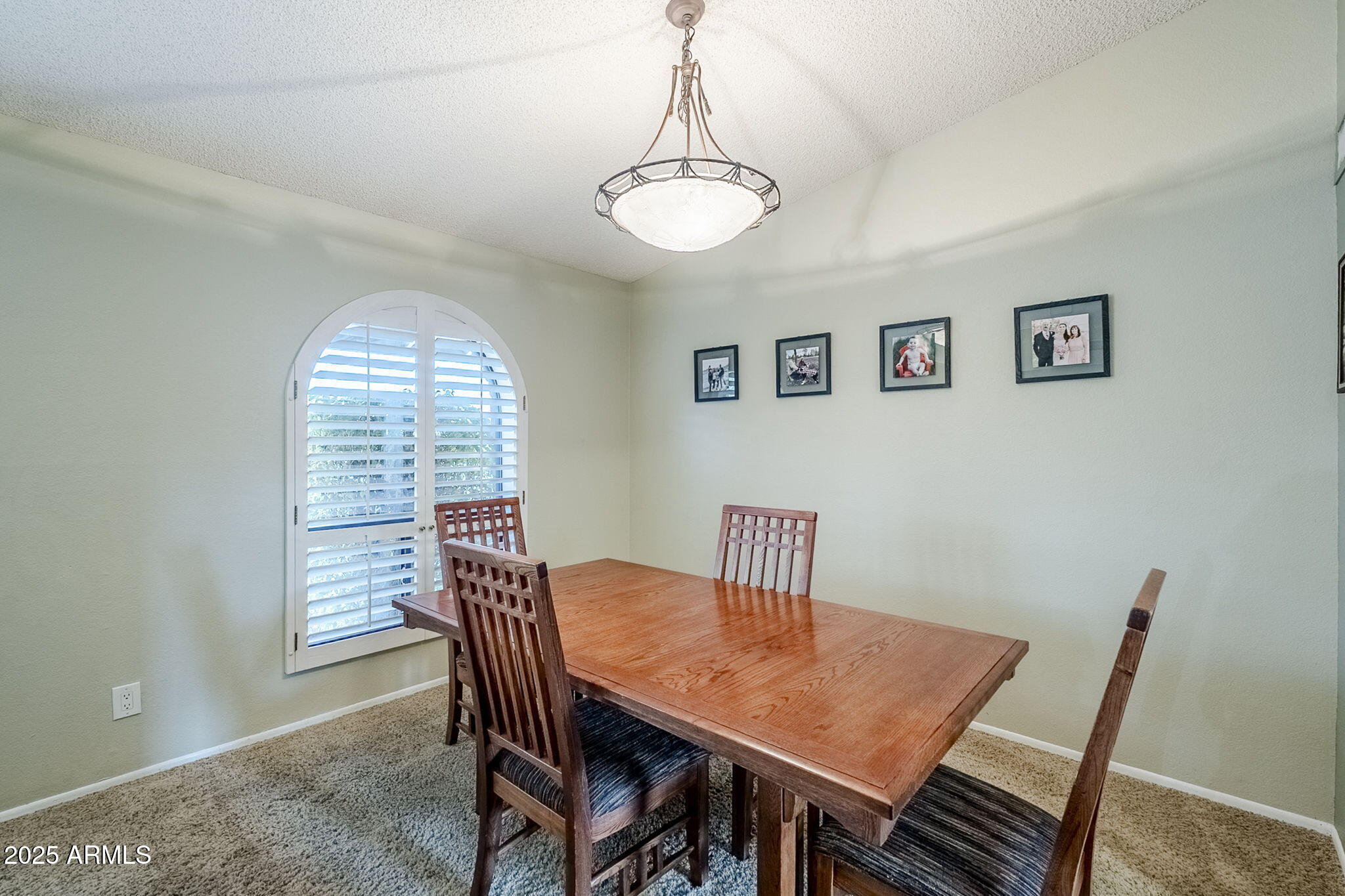 1222 East Louis Way Tempe, AZ 85284 - Photo 16 of 39 a view of a dining room with furniture window and wooden floor
