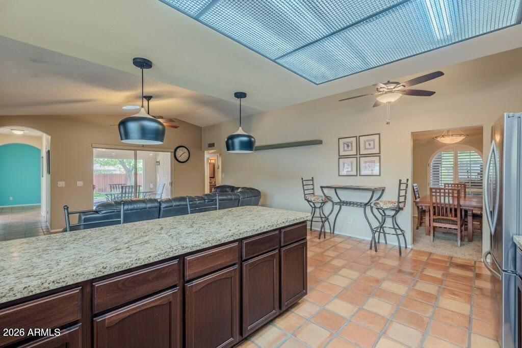 1222 East Louis Way Tempe, AZ 85284 - Photo 22 of 39 a kitchen with granite countertop a sink a counter top space and cabinets