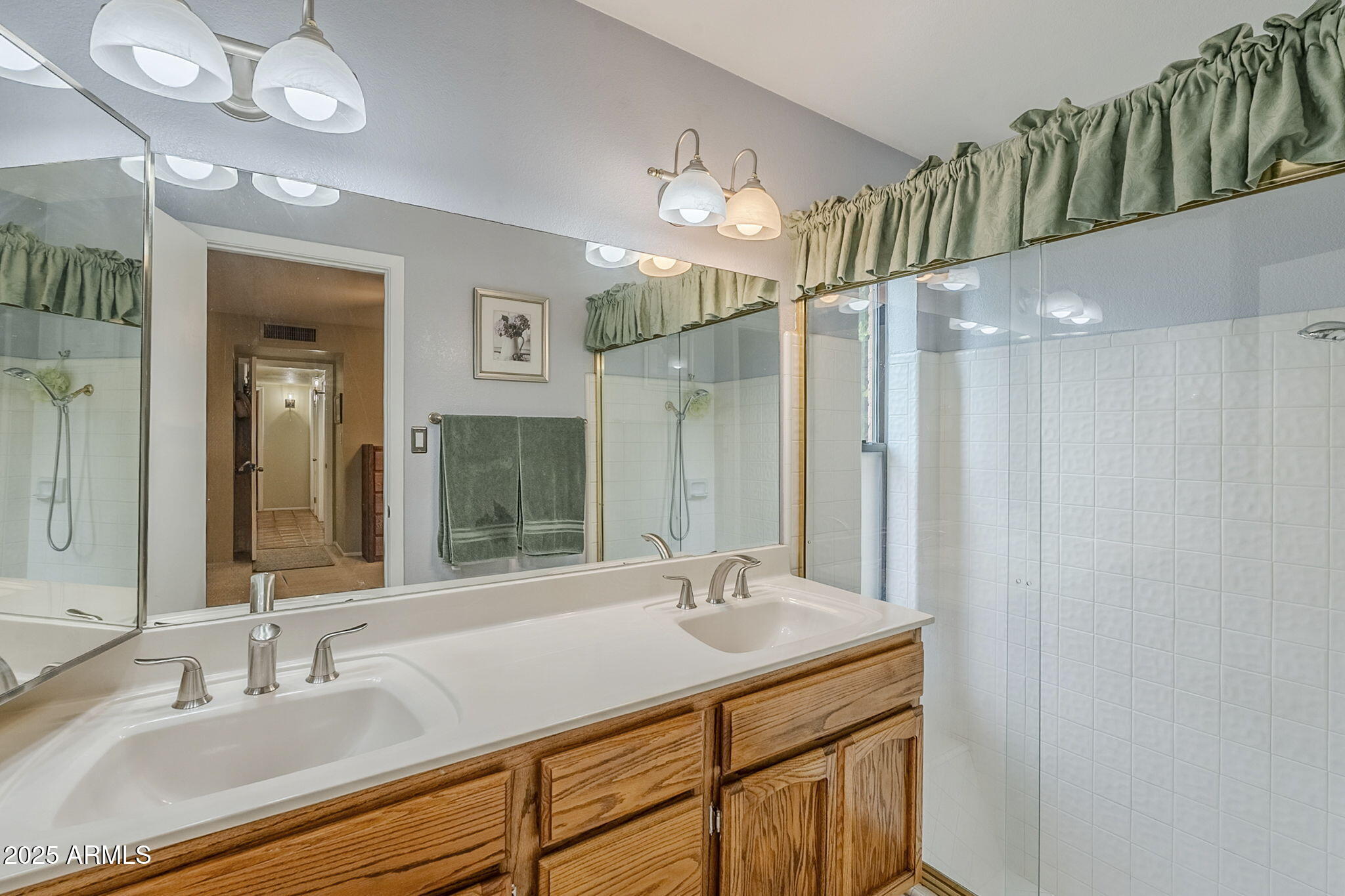 1222 East Louis Way Tempe, AZ 85284 - Photo 25 of 39 a bathroom with a sink double vanity and a mirror