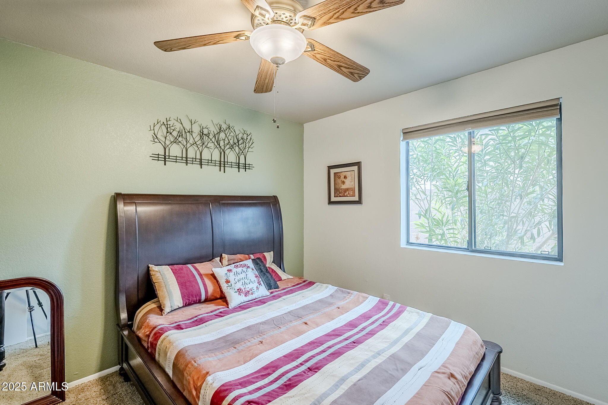 1222 East Louis Way Tempe, AZ 85284 - Photo 28 of 39 a bedroom with a bed and a chandelier