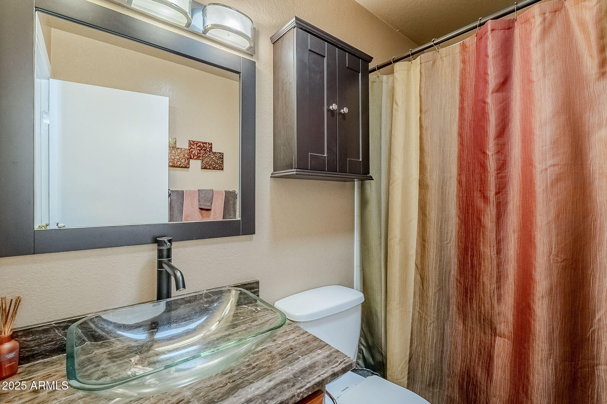 1222 East Louis Way Tempe, AZ 85284 - Photo 29 of 39 a bathroom with a granite countertop sink and a mirror