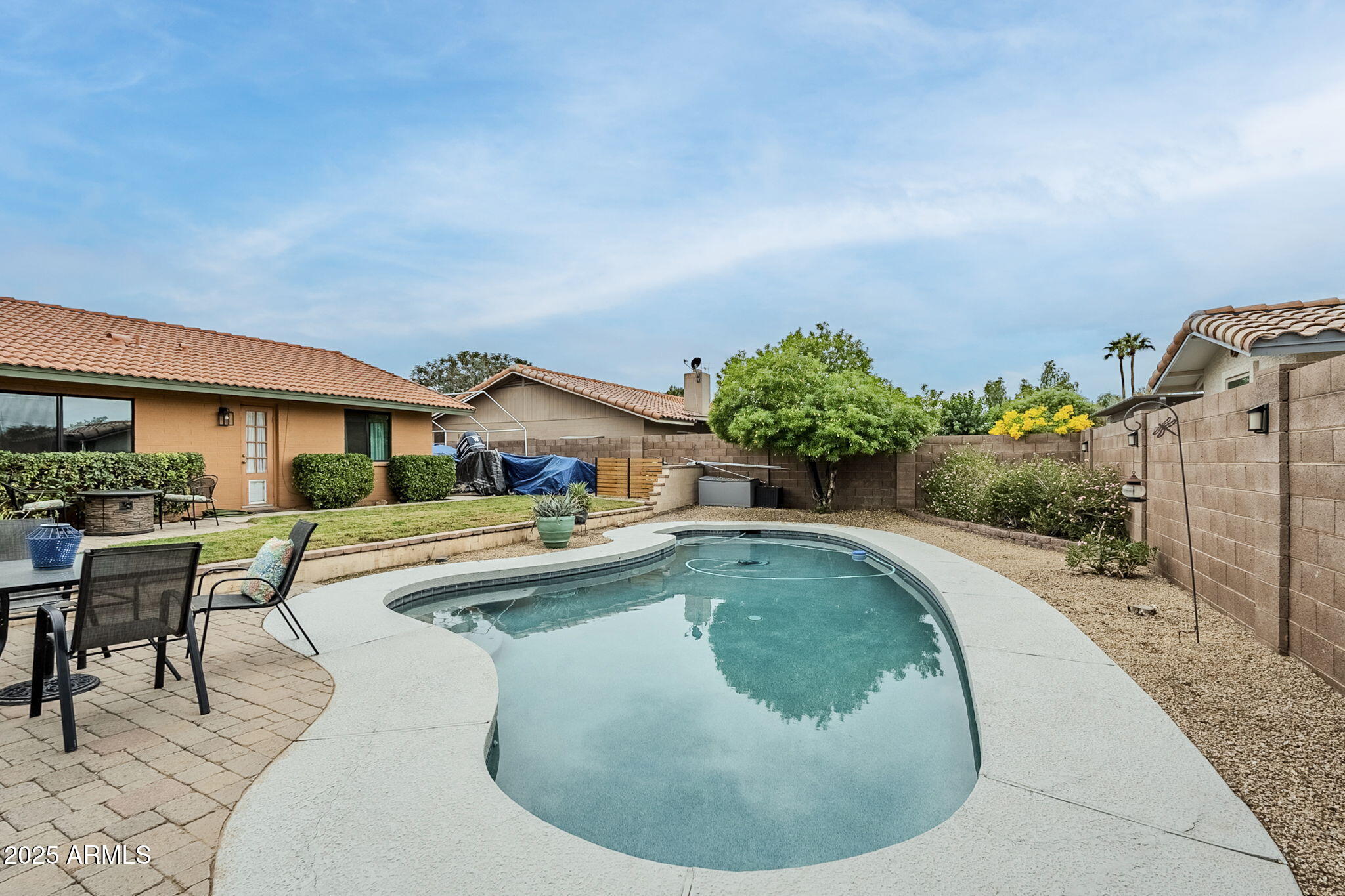 1222 East Louis Way Tempe, AZ 85284 - Photo 37 of 39 swimming pool view with a garden space