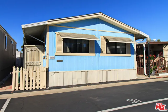 a front view of a house with a garage