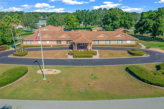 an aerial view of a house with a garden