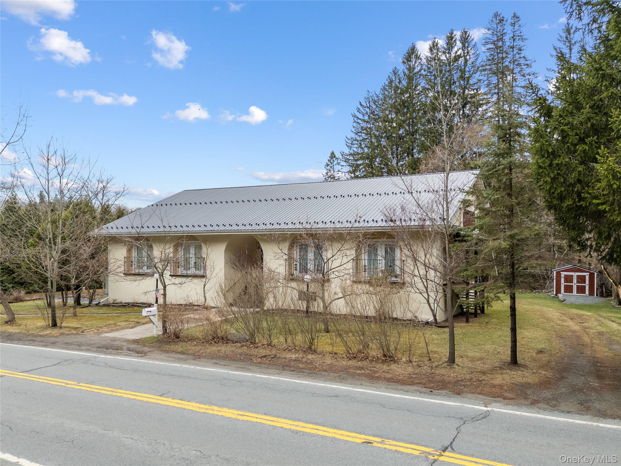 23 Cooley Road Parksville, NY 12768 - Photo 12 of 43 a view of a building with a street