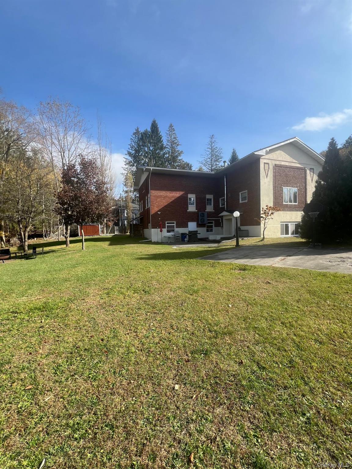 23 Cooley Road Parksville, NY 12768 - Photo 13 of 43 a house view with swimming pool in front of it