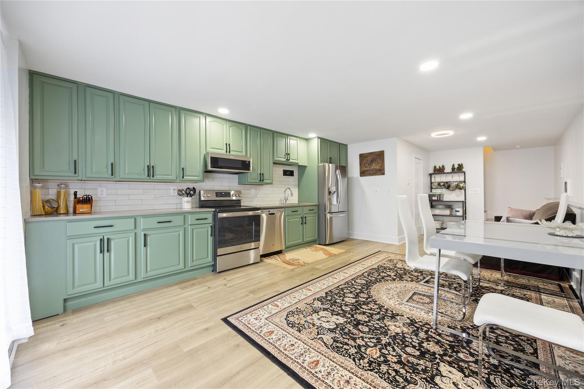 23 Cooley Road Parksville, NY 12768 - Photo 22 of 43 a kitchen with a refrigerator and a sink