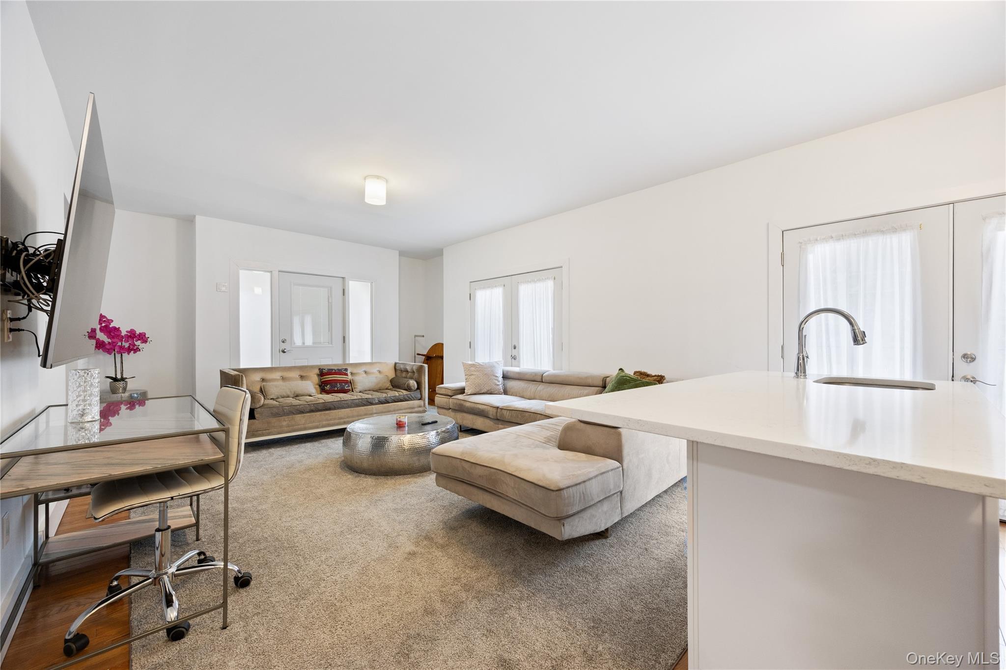 23 Cooley Road Parksville, NY 12768 - Photo 34 of 43 a living room with furniture and a flat screen tv