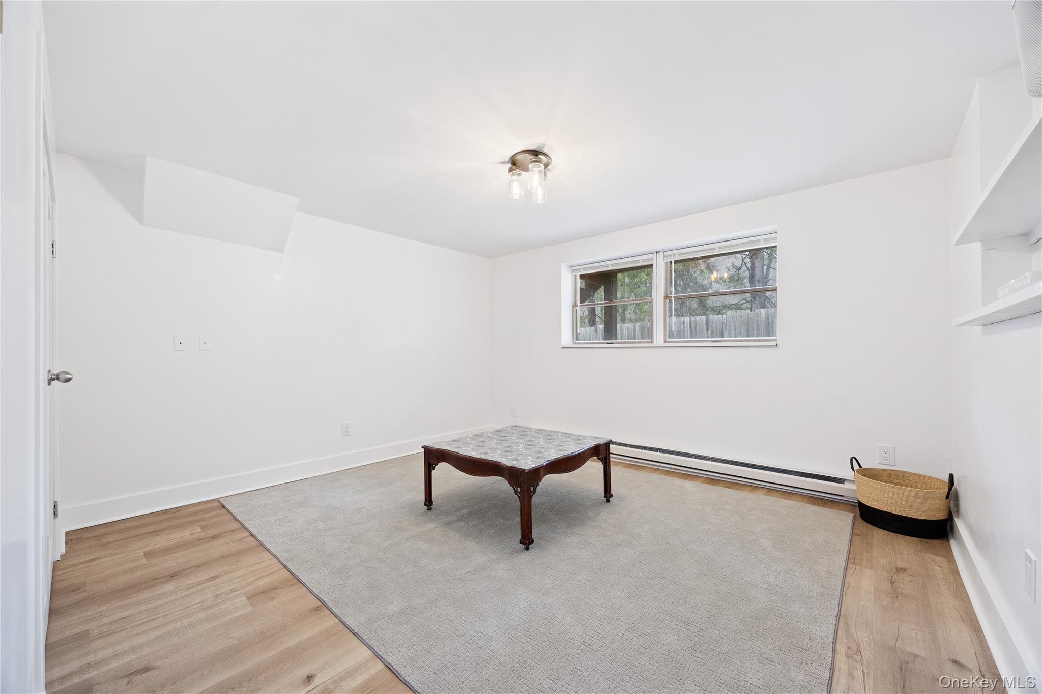 23 Cooley Road Parksville, NY 12768 - Photo 37 of 43 a living room with furniture and a rug
