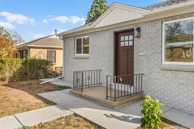 a front view of a house with a porch