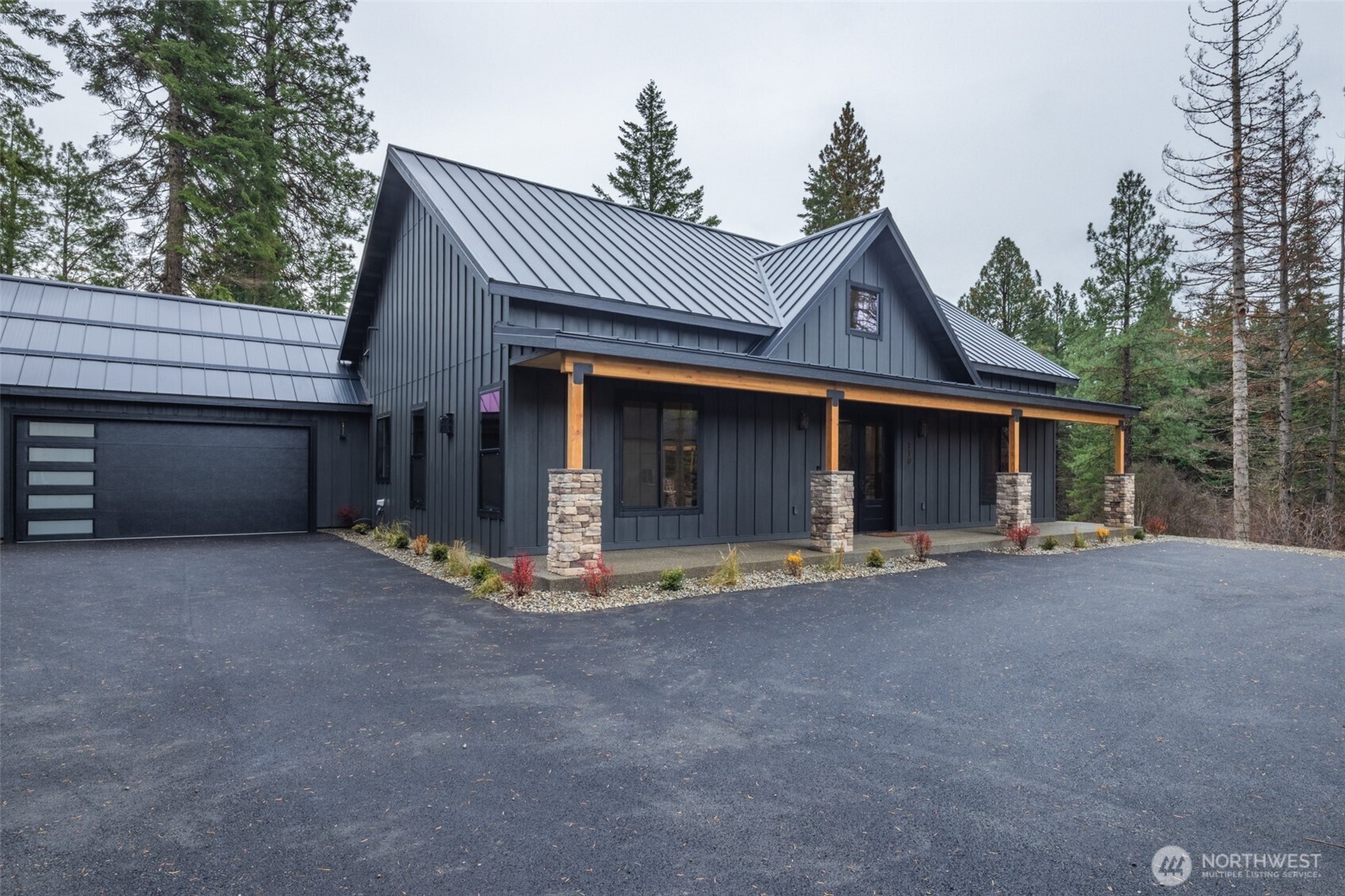 110 Bitterroot Lane Ronald, WA 98940 - Photo 3 of 28 a front view of a house with a garage