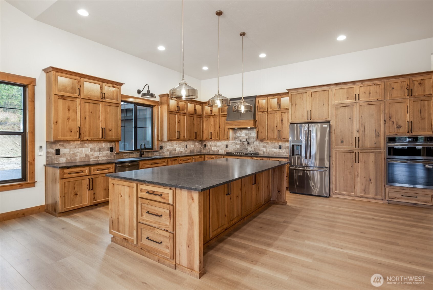 110 Bitterroot Lane Ronald, WA 98940 - Photo 4 of 28 a kitchen with stainless steel appliances granite countertop a sink counter space cabinets and a large window