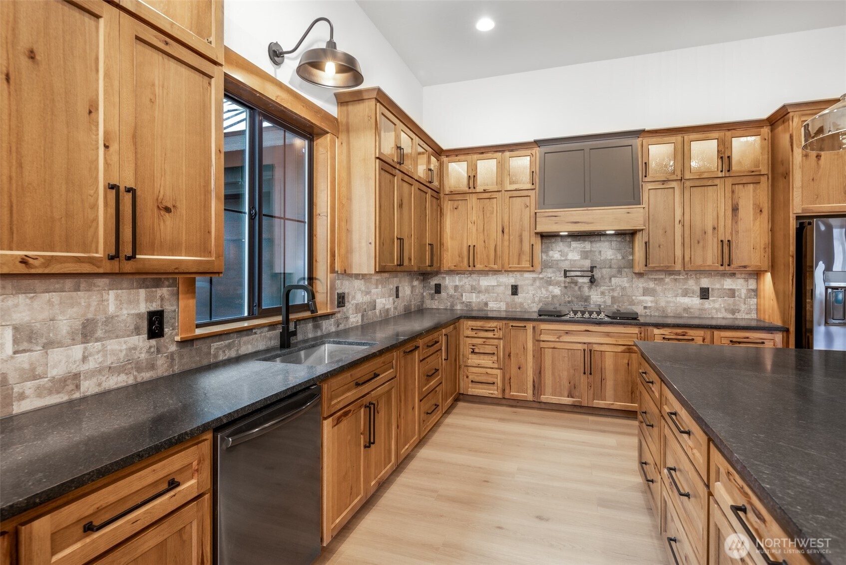110 Bitterroot Lane Ronald, WA 98940 - Photo 5 of 28 a kitchen with stainless steel appliances granite countertop a sink a stove cabinets counter space and a window