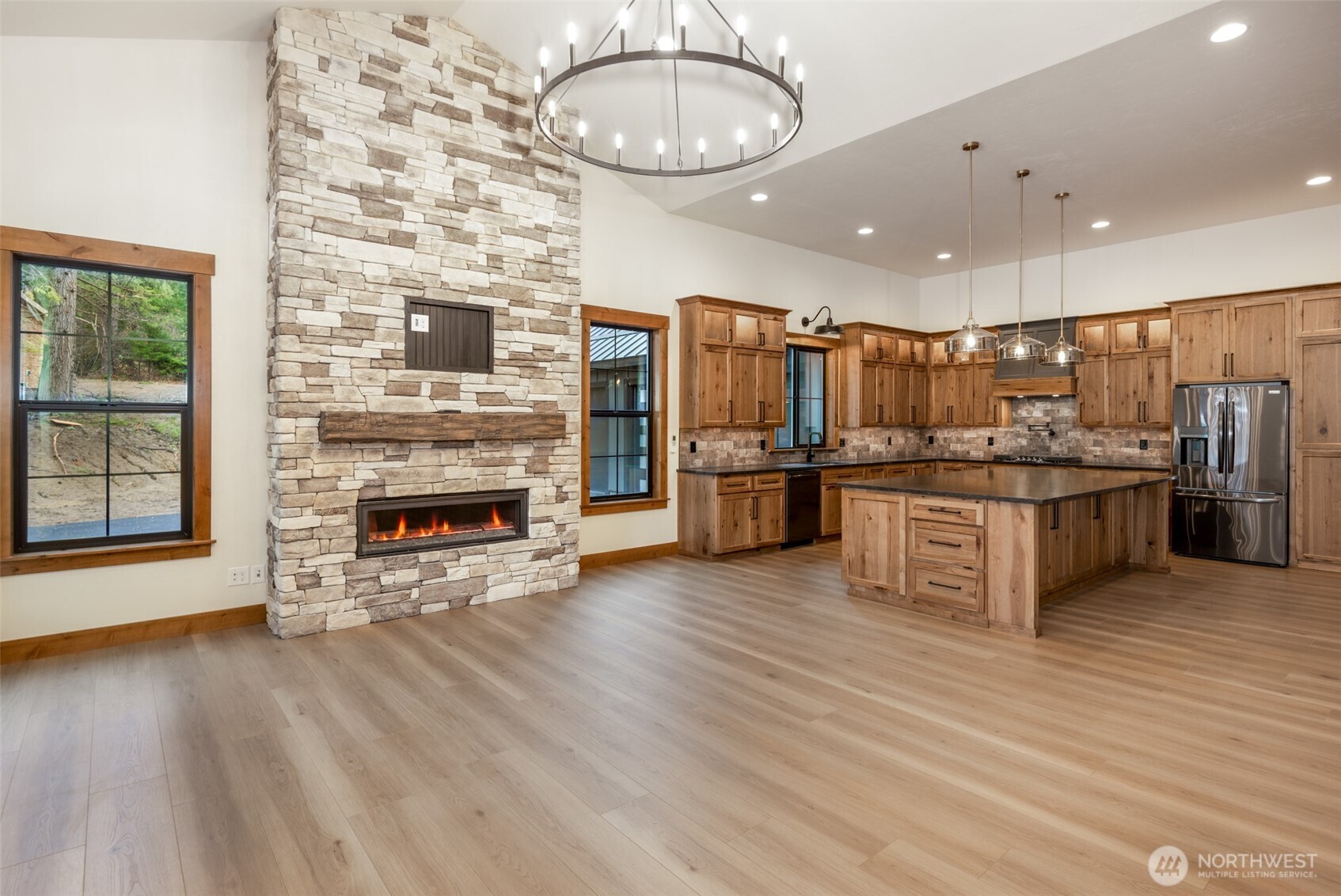 110 Bitterroot Lane Ronald, WA 98940 - Photo 9 of 28 a open kitchen with stainless steel appliances granite countertop a stove and cabinets