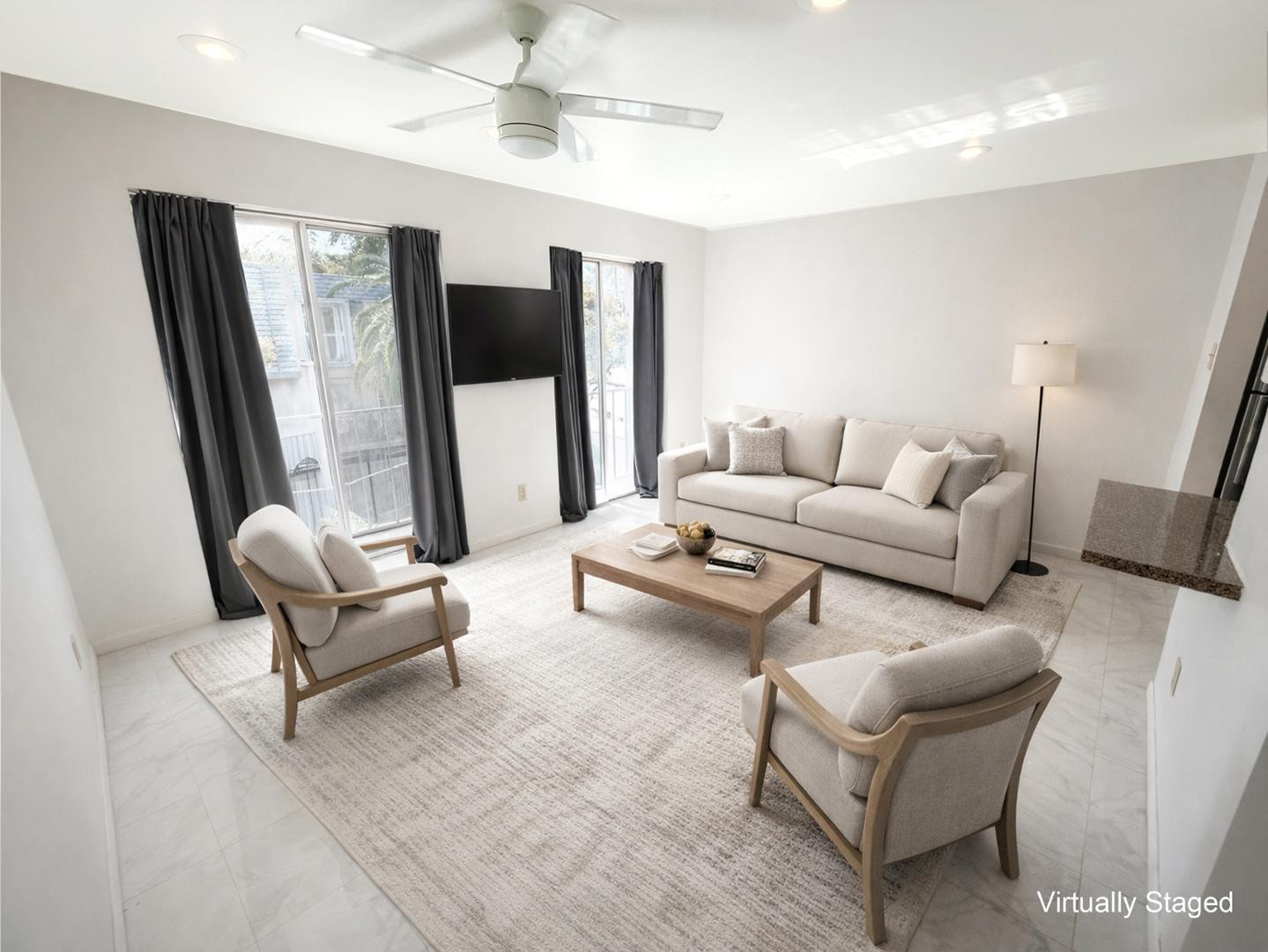 1016 East Osborn Road, Unit F Phoenix, AZ 85014 - Photo 2 of 14 a living room with furniture and a large window