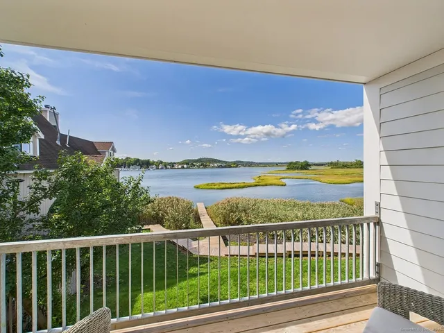 a view of a city street from a balcony