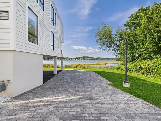 a view of a swimming pool with a yard