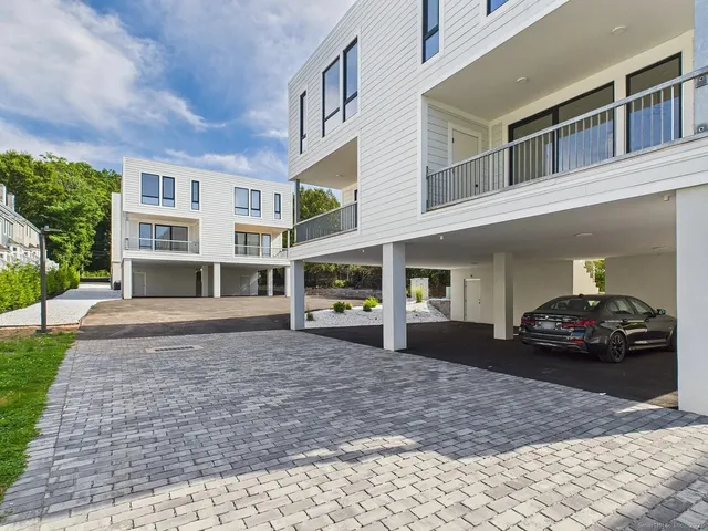 a view of a car park in front of a building