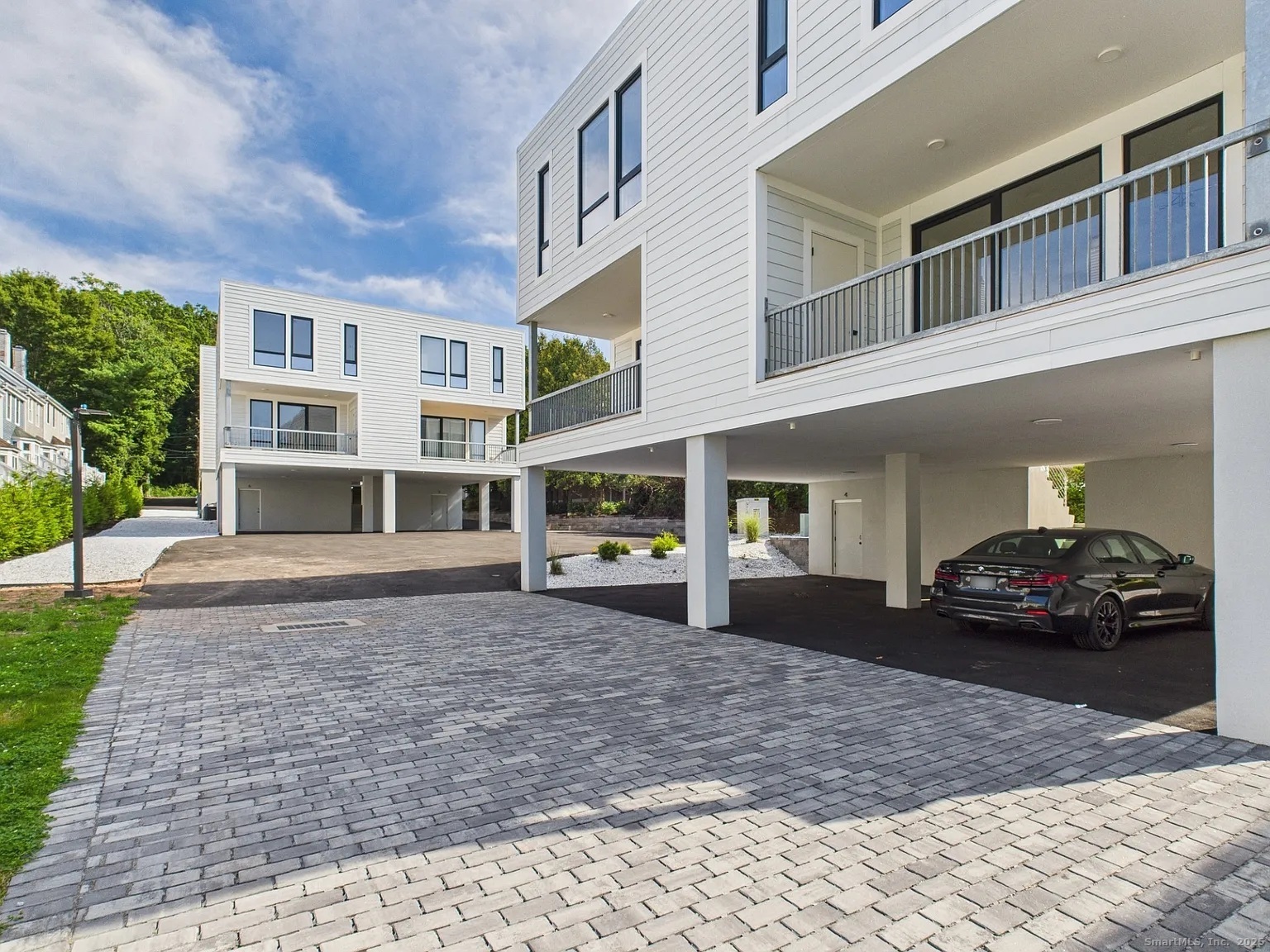 904 Quinnipiac Avenue, Unit 3 New Haven, CT 06513 - Photo 17 of 19 a view of a car park in front of a building