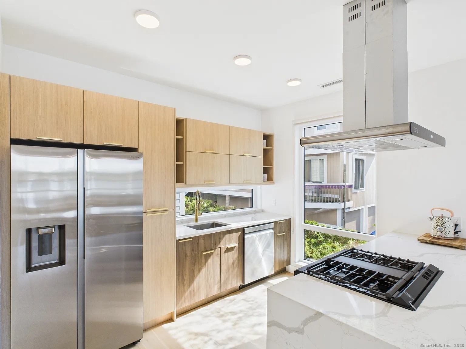 904 Quinnipiac Avenue, Unit 3 New Haven, CT 06513 - Photo 2 of 19 a kitchen with stainless steel appliances granite countertop a refrigerator a sink and a stove