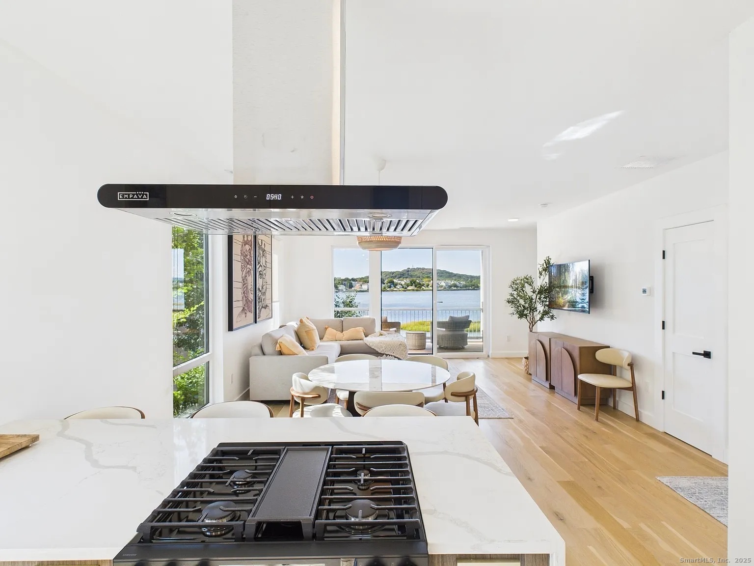 904 Quinnipiac Avenue, Unit 3 New Haven, CT 06513 - Photo 3 of 19 a living room with furniture and large windows