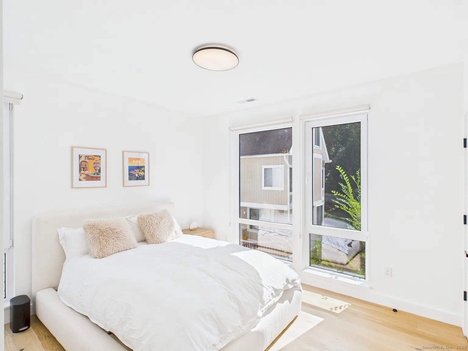 904 Quinnipiac Avenue, Unit 3 New Haven, CT 06513 - Photo 4 of 19 a bedroom with a bed and a window