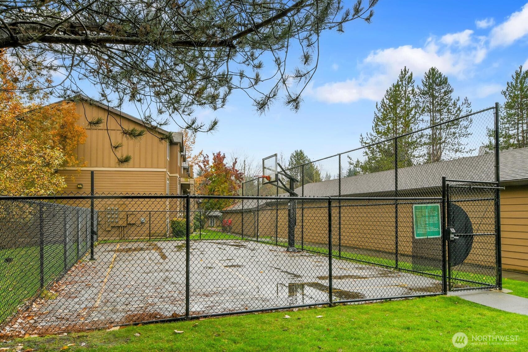 18930 Bothell Everett Highway, Unit F305 Bothell, WA 98012 - Photo 19 of 20 a view of a backyard with sitting area