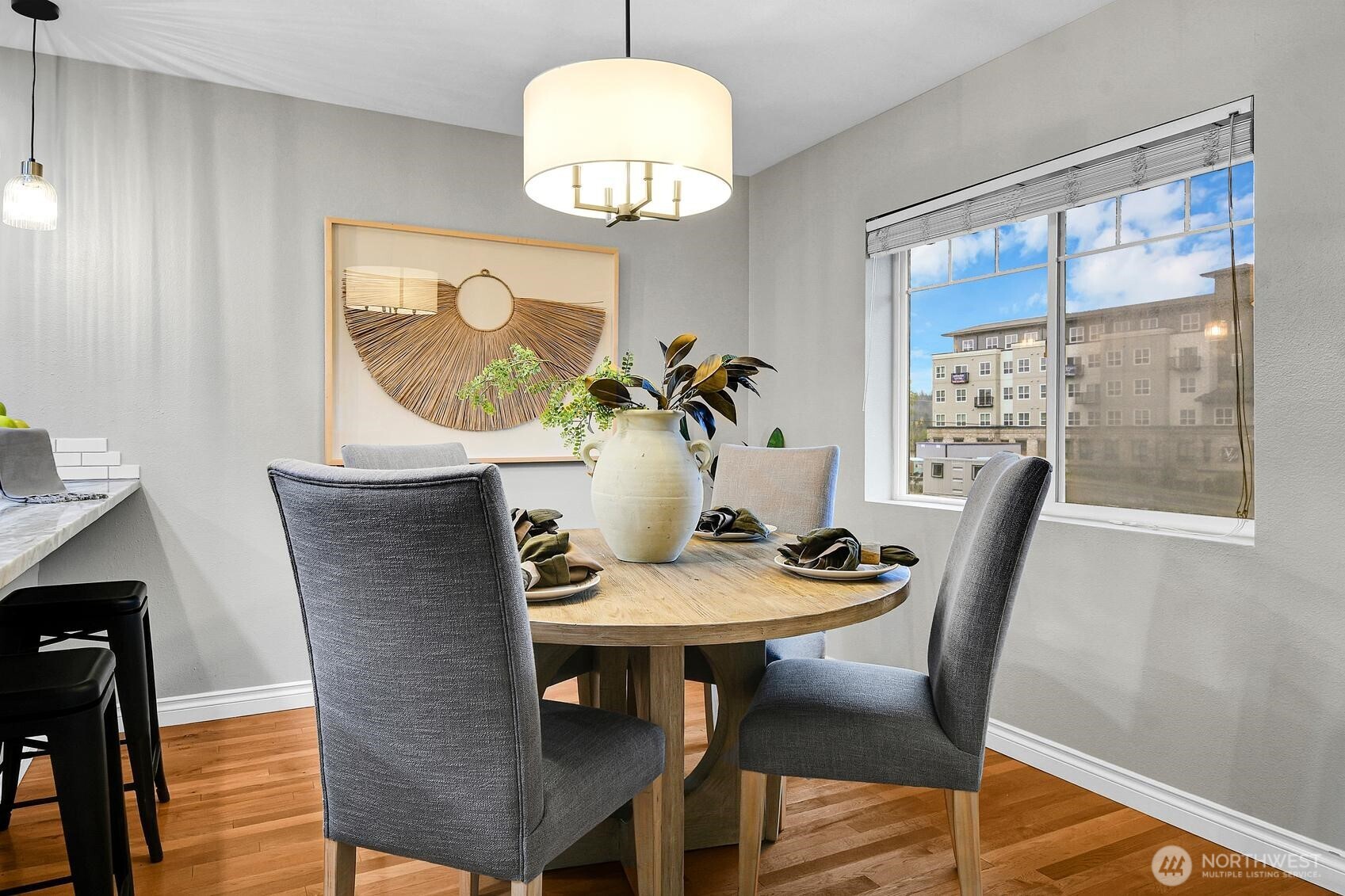 18930 Bothell Everett Highway, Unit F305 Bothell, WA 98012 - Photo 9 of 20 a dining room with furniture and window
