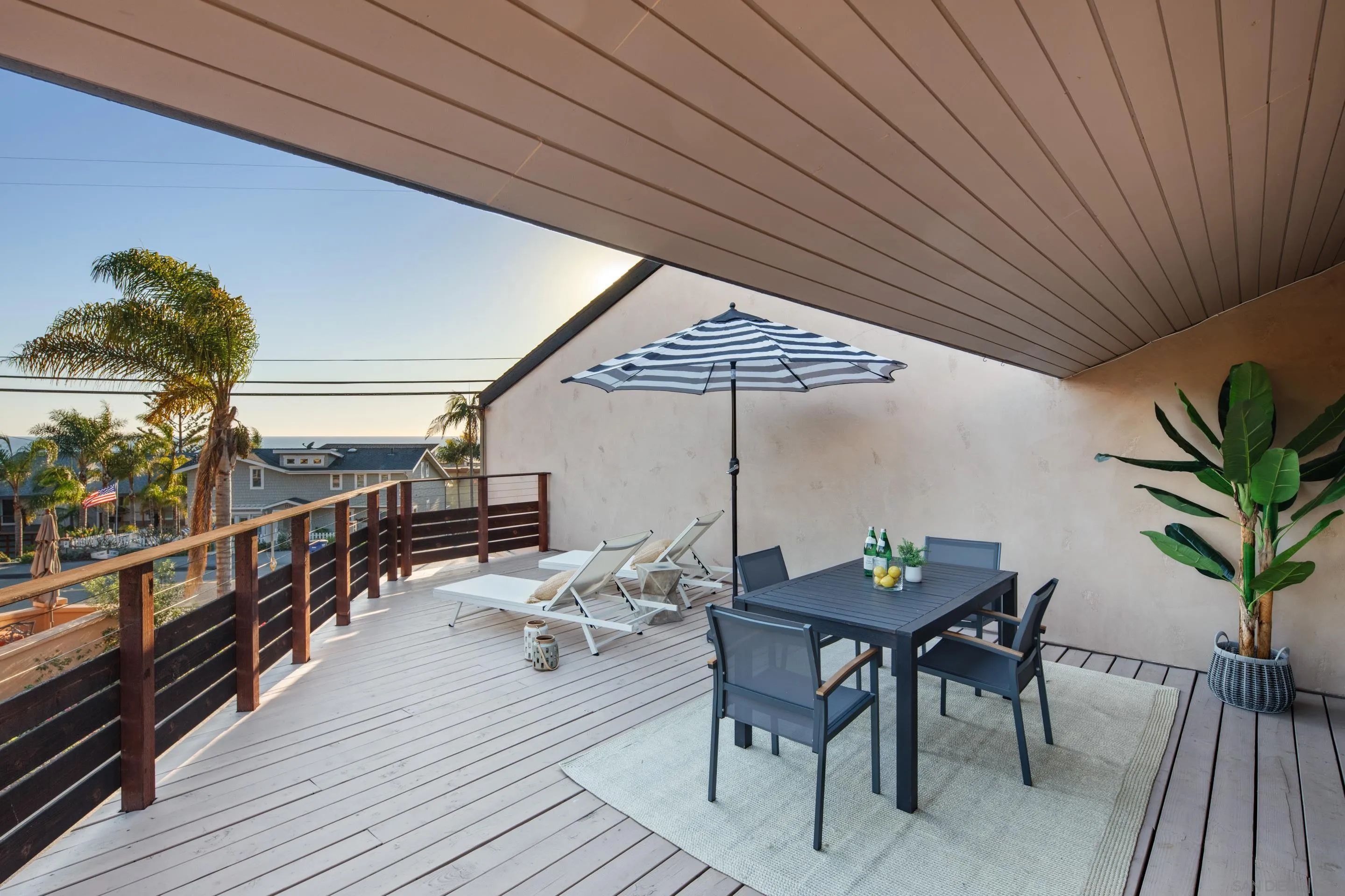 1557 Summit Avenue Cardiff, CA 92007 - Photo 20 of 28 a dining room with furniture and wooden floor