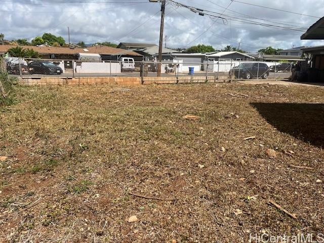 91-385 Papipi Road Ewa Beach, HI 96706 - Photo 1 of 1 a view of swimming pool with a yard