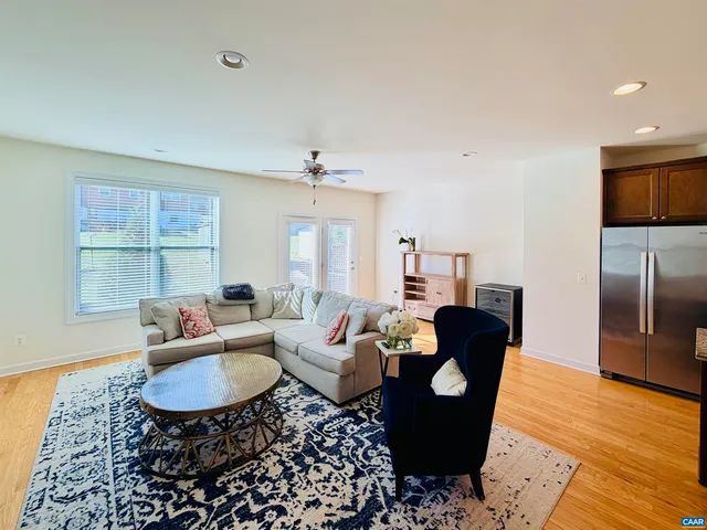 a living room with furniture and a table