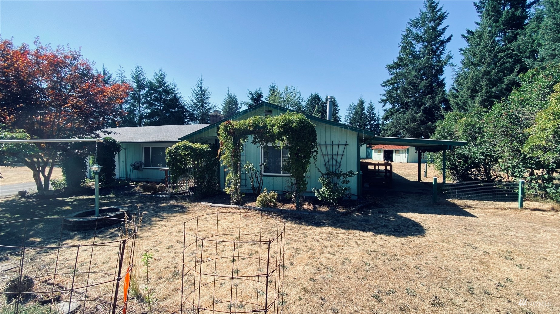 18401 Apricot Street Southwest Rochester, WA 98579 - Photo 3 of 29 a view of a house with yard and sitting area