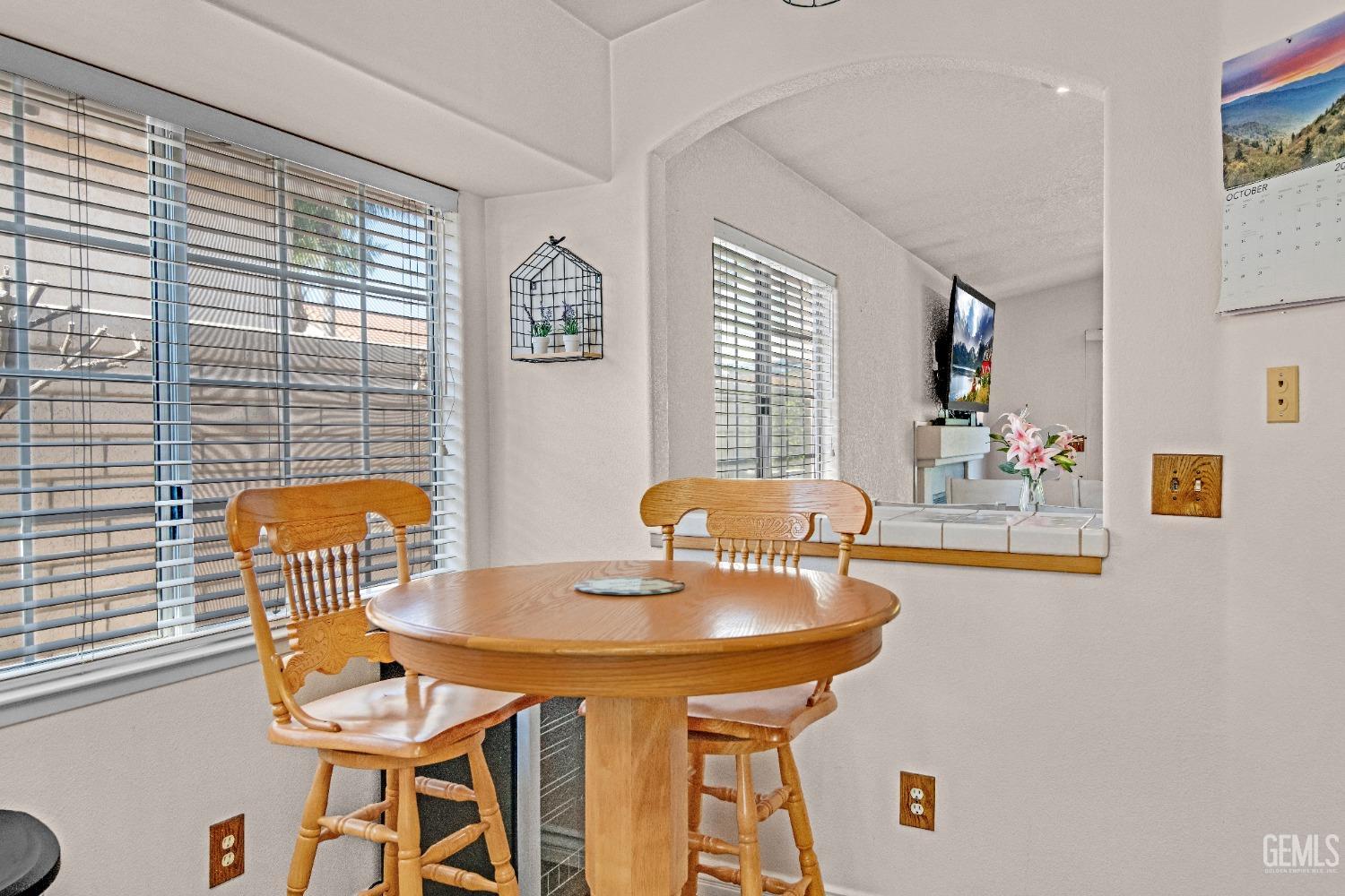 Undisclosed Address Bakersfield, CA 93312 - Photo 11 of 43 a view of a dining room with furniture and window
