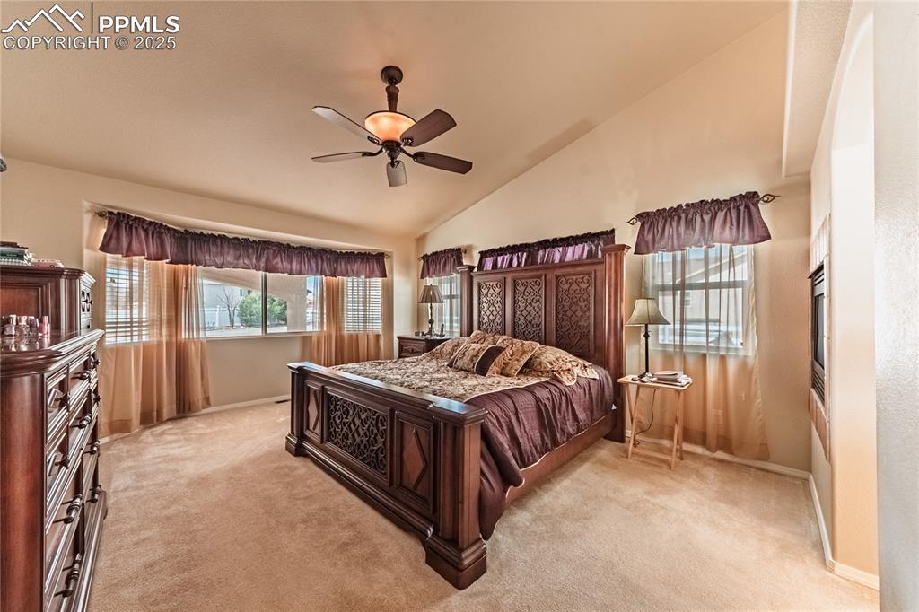 11171 Allendale Drive Peyton, CO 80831 - Photo 17 of 50 a bed sitting in a room next to a window